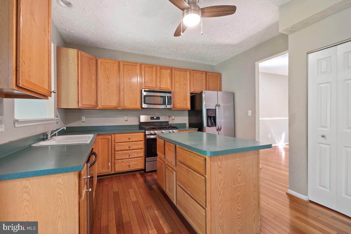 8114 Bell Tower Crossing Pasadena, MD 21122 - Photo 13 of 44 Kitchen