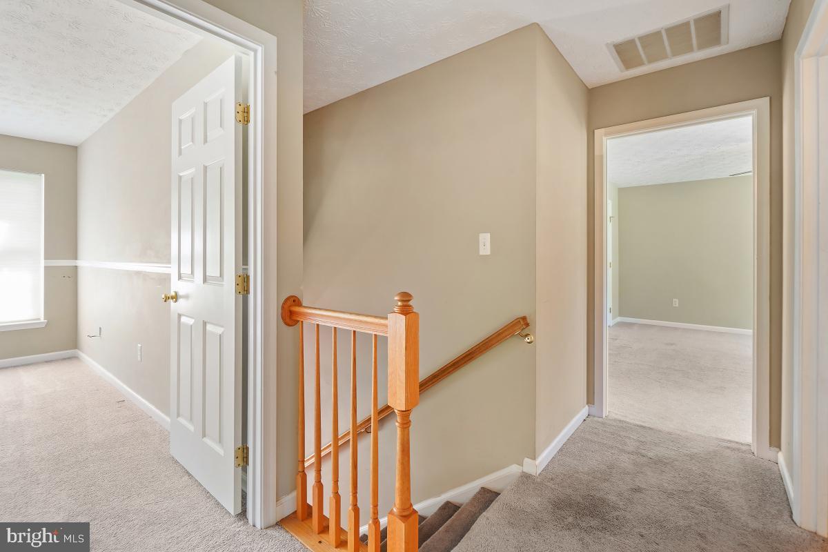 8114 Bell Tower Crossing Pasadena, MD 21122 - Photo 24 of 44 Upper Level Hallway