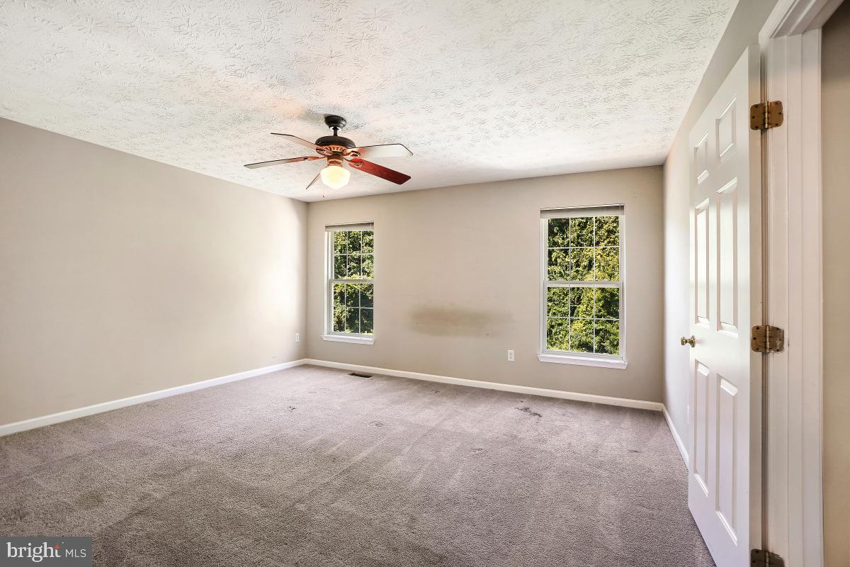 8114 Bell Tower Crossing Pasadena, MD 21122 - Photo 25 of 44 Primary Bedroom