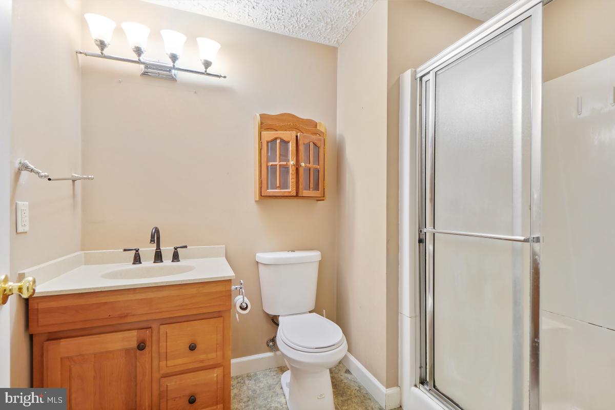 8114 Bell Tower Crossing Pasadena, MD 21122 - Photo 37 of 44 Full Bath Basement