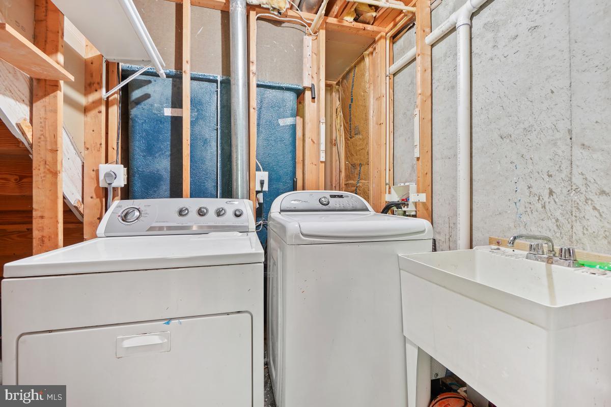 8114 Bell Tower Crossing Pasadena, MD 21122 - Photo 39 of 44 Laundry