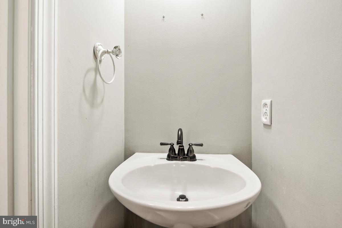 8114 Bell Tower Crossing Pasadena, MD 21122 - Photo 8 of 44 Half Bath