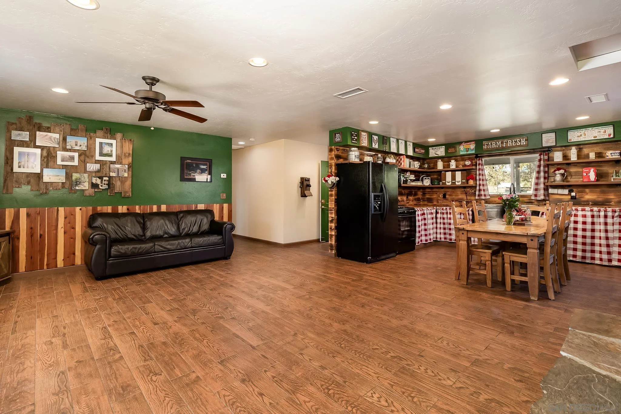 1610 Montecito Road Ramona, CA 92065 - Photo 5 of 34 a view of a livingroom with furniture and a ceiling fan