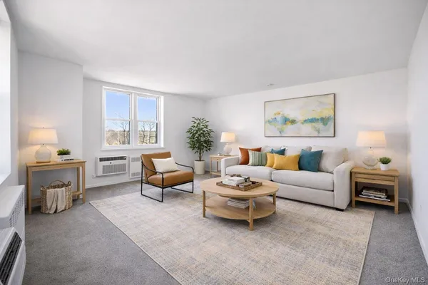 a living room with furniture and a couch
