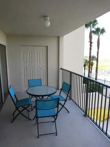 a view of a room with furniture window and wooden floor