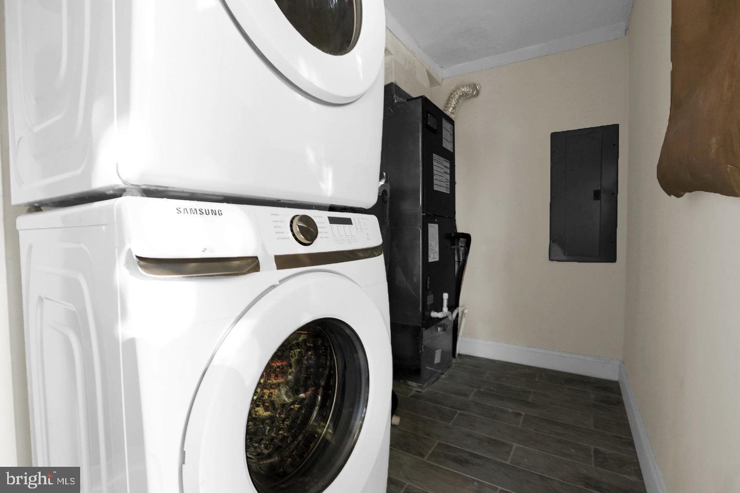 203 Sollers Point Road Dundalk, MD 21222 - Photo 8 of 16 Modern laundry space with sleek appliances.