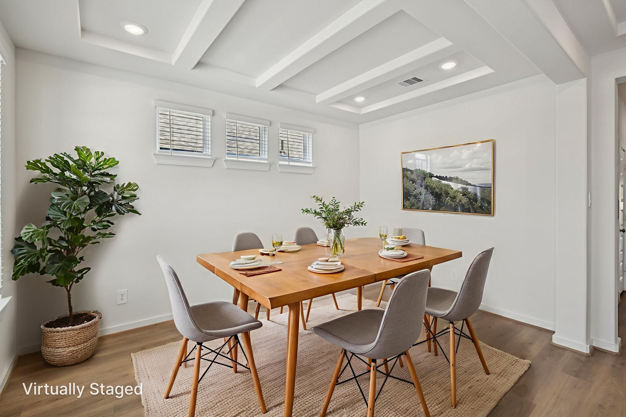 6631 Castella Drive Rosharon, TX 77583 - Photo 5 of 47 a dining room with furniture potted plants and wooden floor