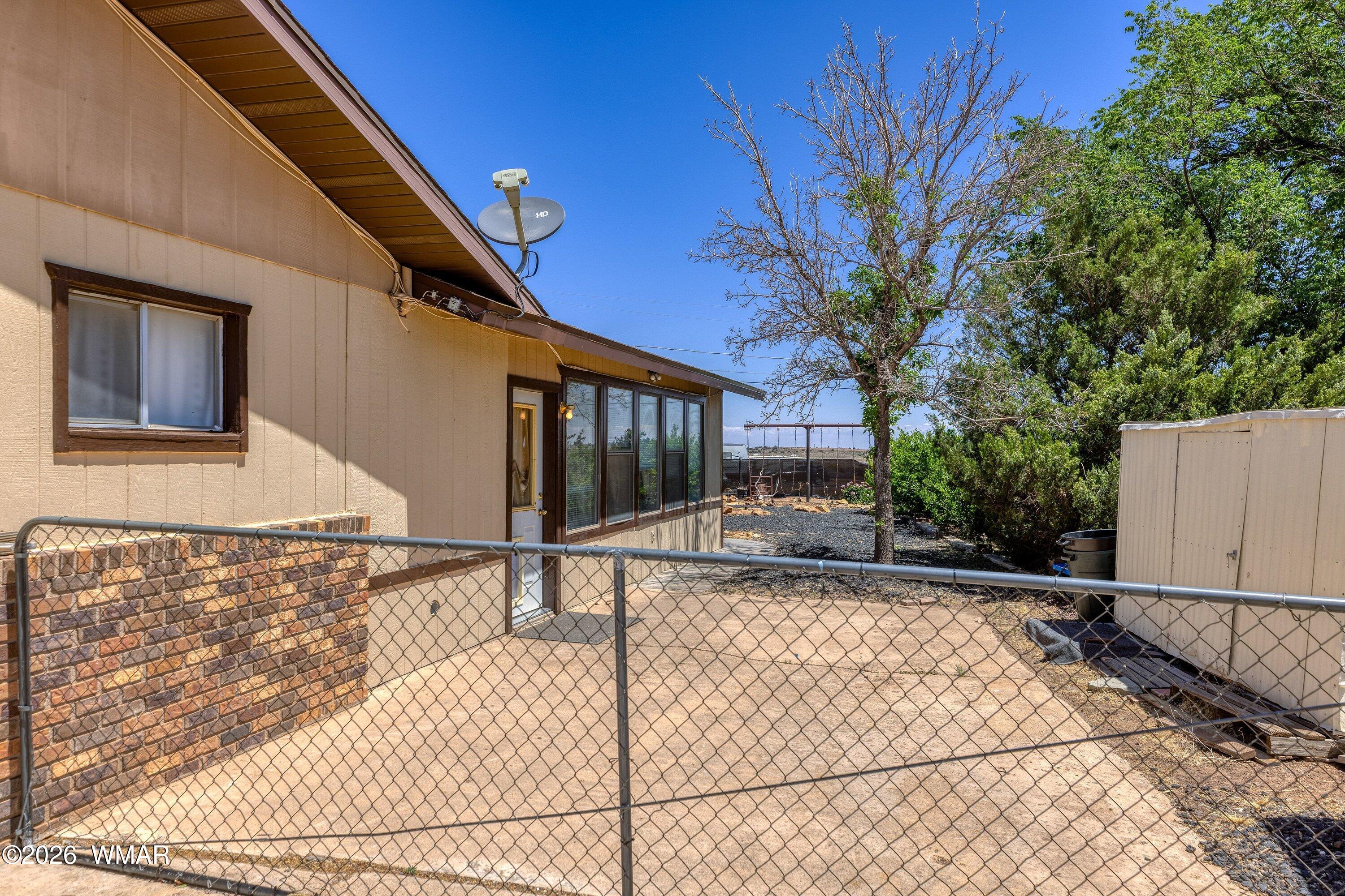 1114 Ranch Road Taylor, AZ 85939 - Photo 28 of 32 a view of a house with a patio