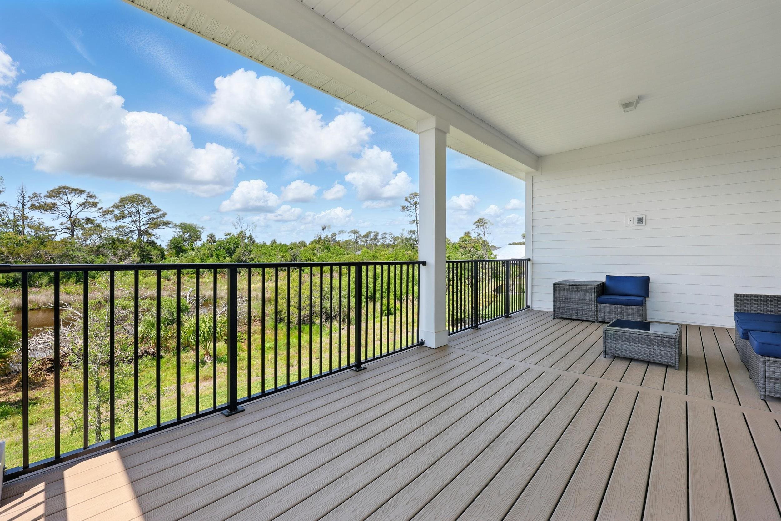 164 Tesoro Terrace St. Augustine, FL 32095 - Photo 32 of 55 a view of a balcony with wooden floor