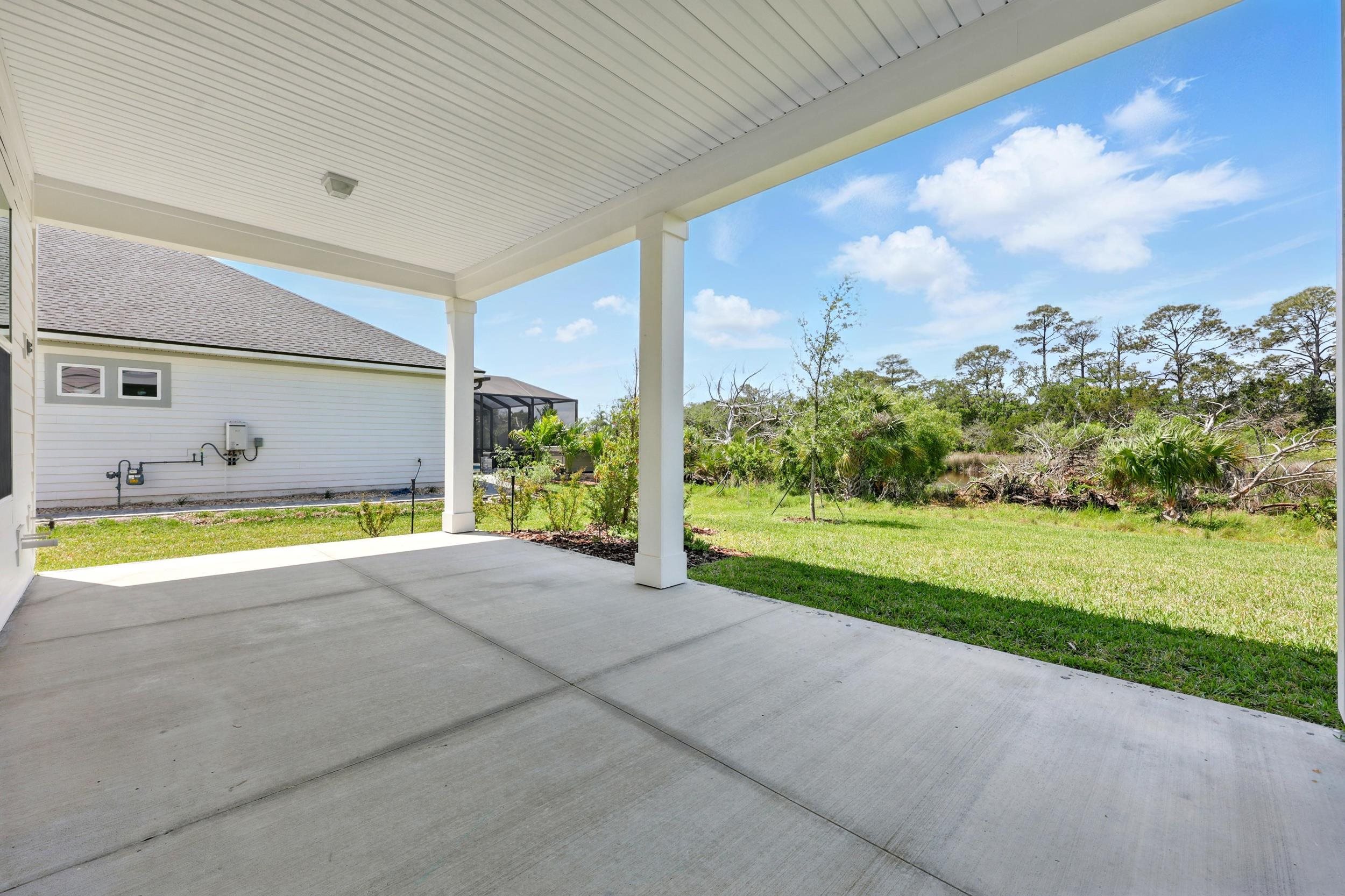 164 Tesoro Terrace St. Augustine, FL 32095 - Photo 38 of 55 a view of a house with a backyard