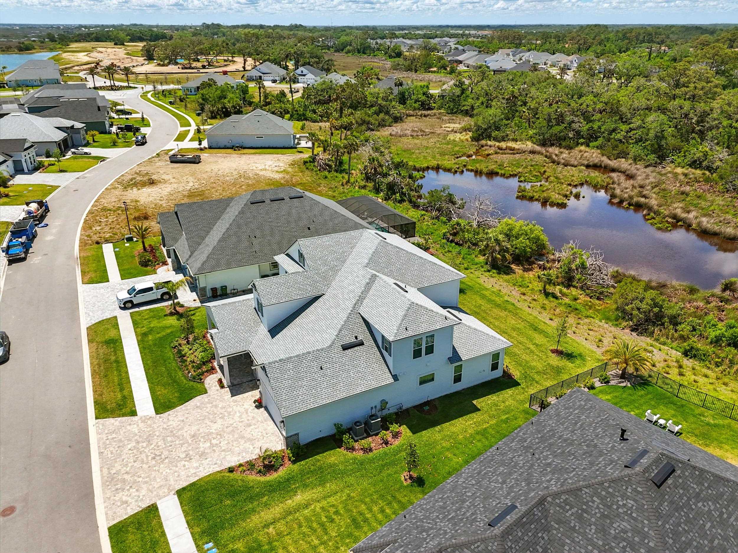 164 Tesoro Terrace St. Augustine, FL 32095 - Photo 47 of 55 an aerial view of a house with a garden