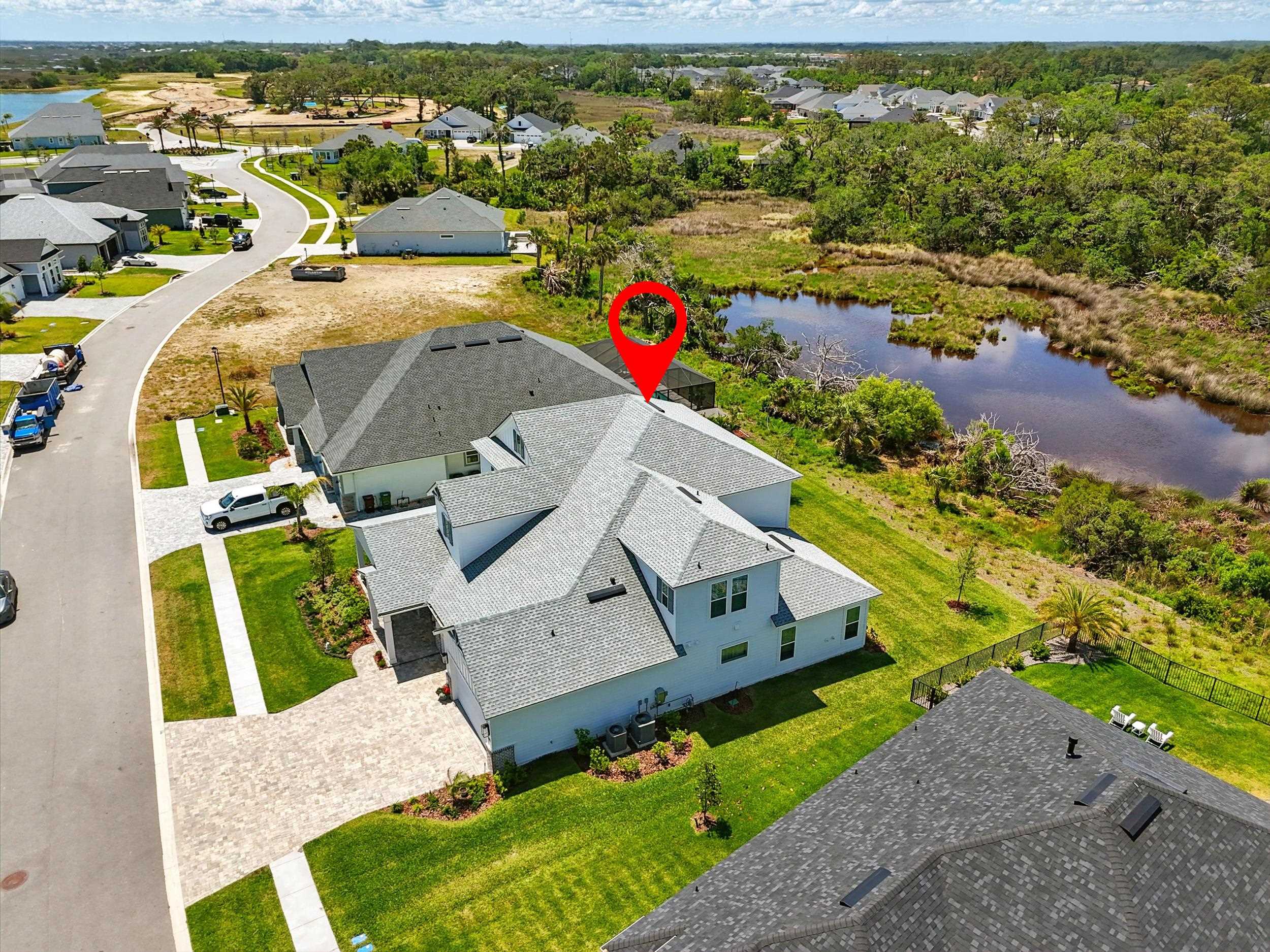 164 Tesoro Terrace St. Augustine, FL 32095 - Photo 48 of 55 an aerial view of a house with a swimming pool