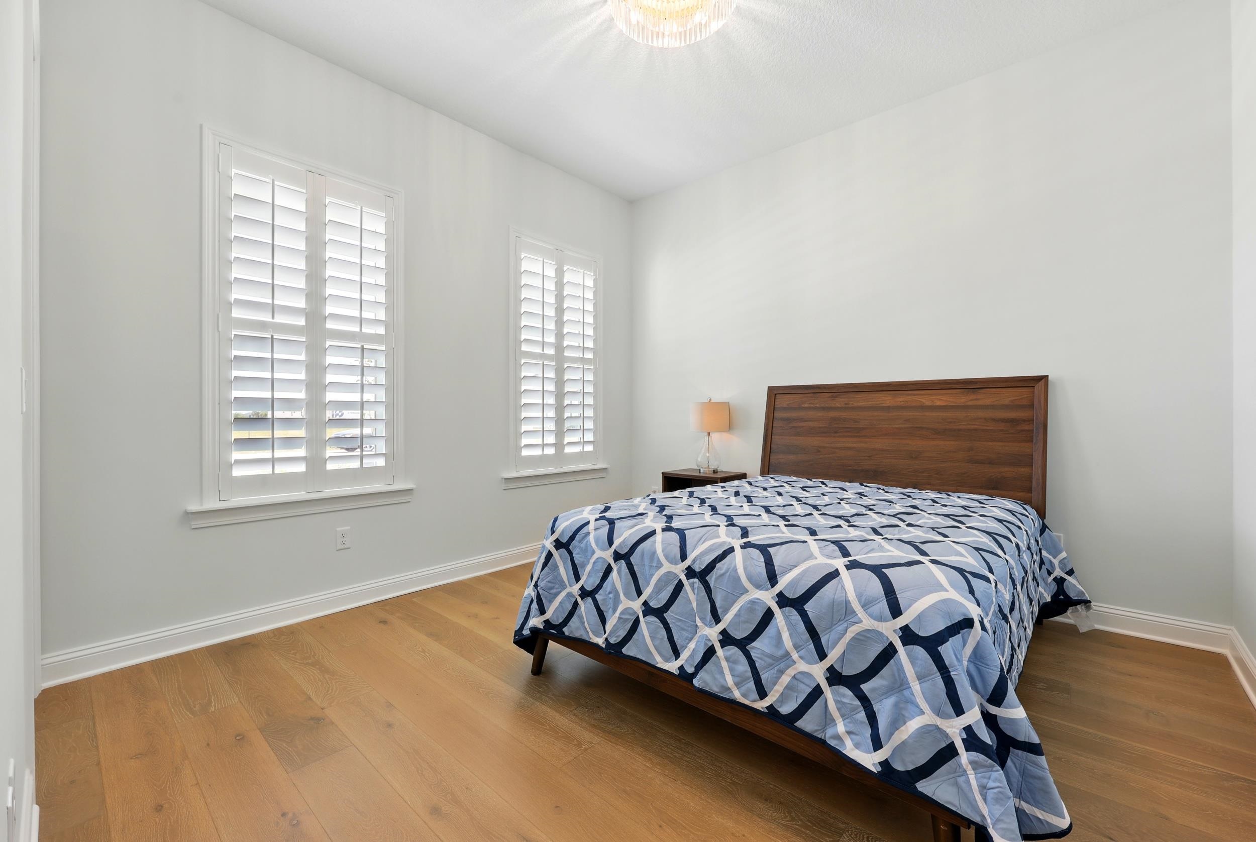 164 Tesoro Terrace St. Augustine, FL 32095 - Photo 8 of 55 a bedroom with a bed and window