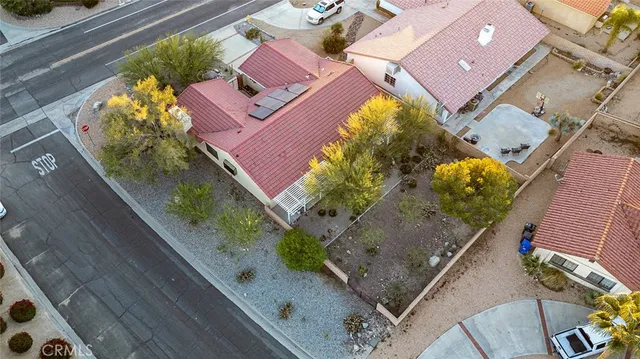 an aerial view of house with yard
