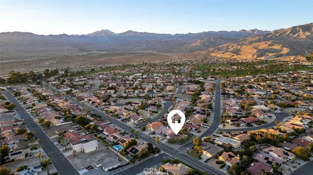 an aerial view of mountain with residential space and mountain view