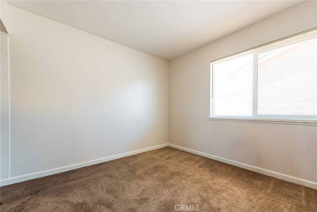 6732 San Joaquin Way Riverside, CA 92503 - Photo 11 of 25 an empty room with a window