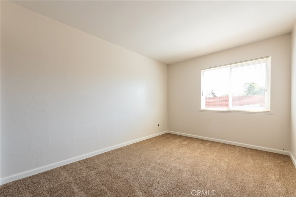 6732 San Joaquin Way Riverside, CA 92503 - Photo 9 of 25 an empty room with a window