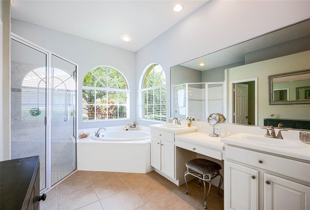 956 Scherer Way Osprey, FL 34229 - Photo 17 of 38 a view of bathroom with dual sinks