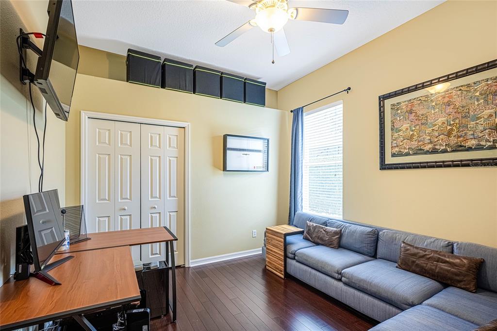 956 Scherer Way Osprey, FL 34229 - Photo 20 of 38 a living room with furniture and a window