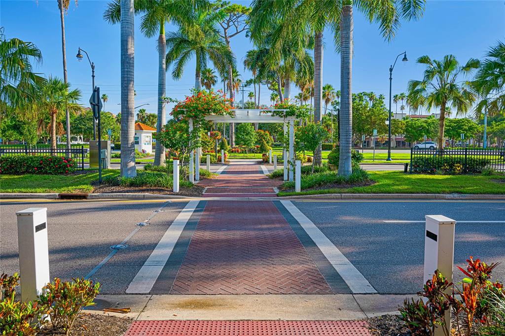 956 Scherer Way Osprey, FL 34229 - Photo 35 of 38 a view of a garden with palm trees