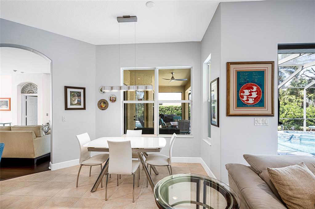 956 Scherer Way Osprey, FL 34229 - Photo 10 of 38 a view of a livingroom with furniture and window