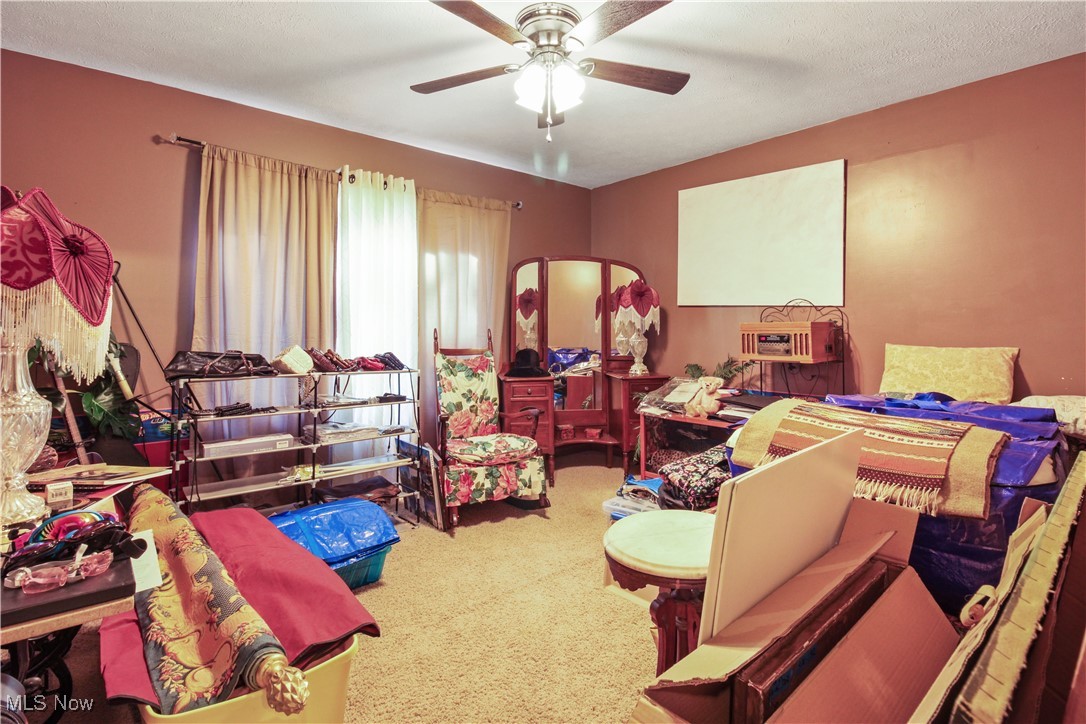 2632 Berry Road Akron, OH 44320 - Photo 25 of 39 Carpeted bedroom with ceiling fan