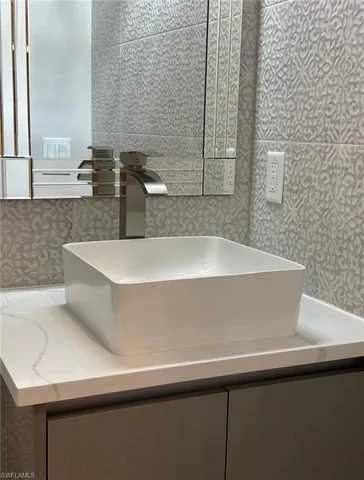 a view of a sink and a mirror