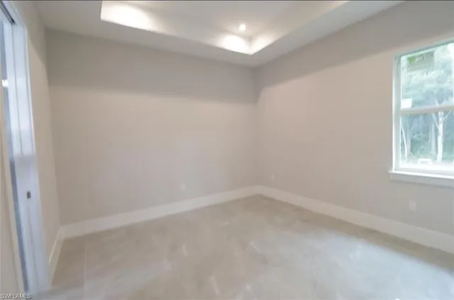 en empty room with windows