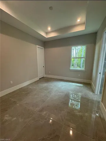 en empty room with windows