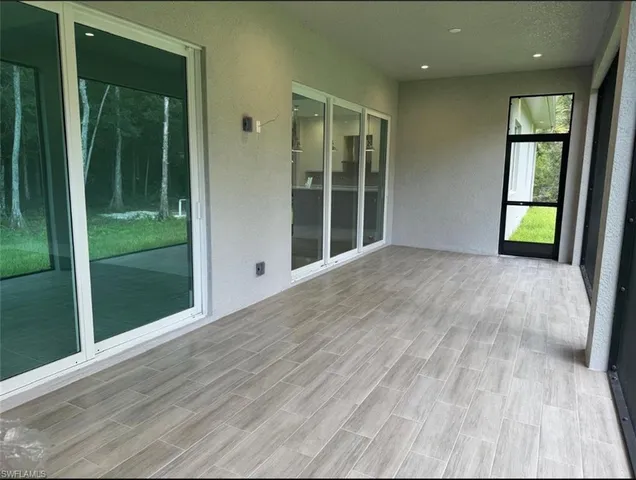 a view of a garden with an outdoor space