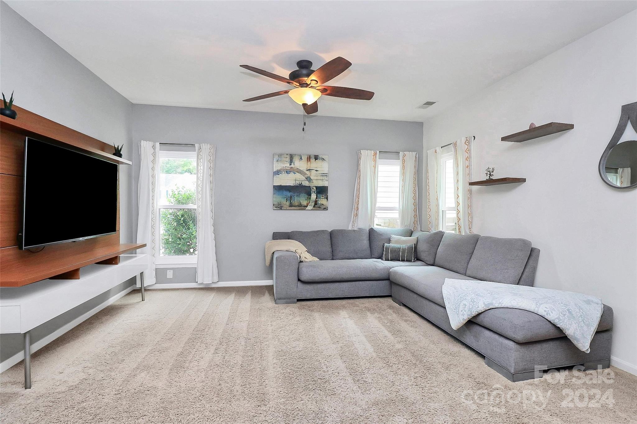 536 St George Road Fort Mill, SC 29708 - Photo 20 of 48 a living room with furniture and a flat screen tv