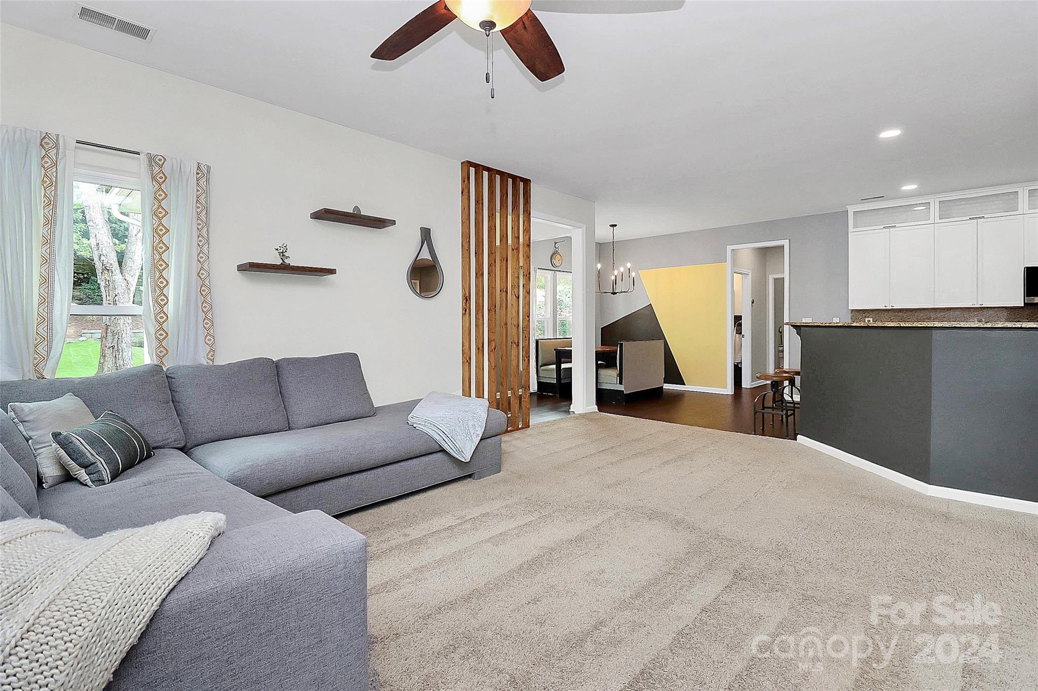 536 St George Road Fort Mill, SC 29708 - Photo 21 of 48 a living room with furniture and a ceiling fan