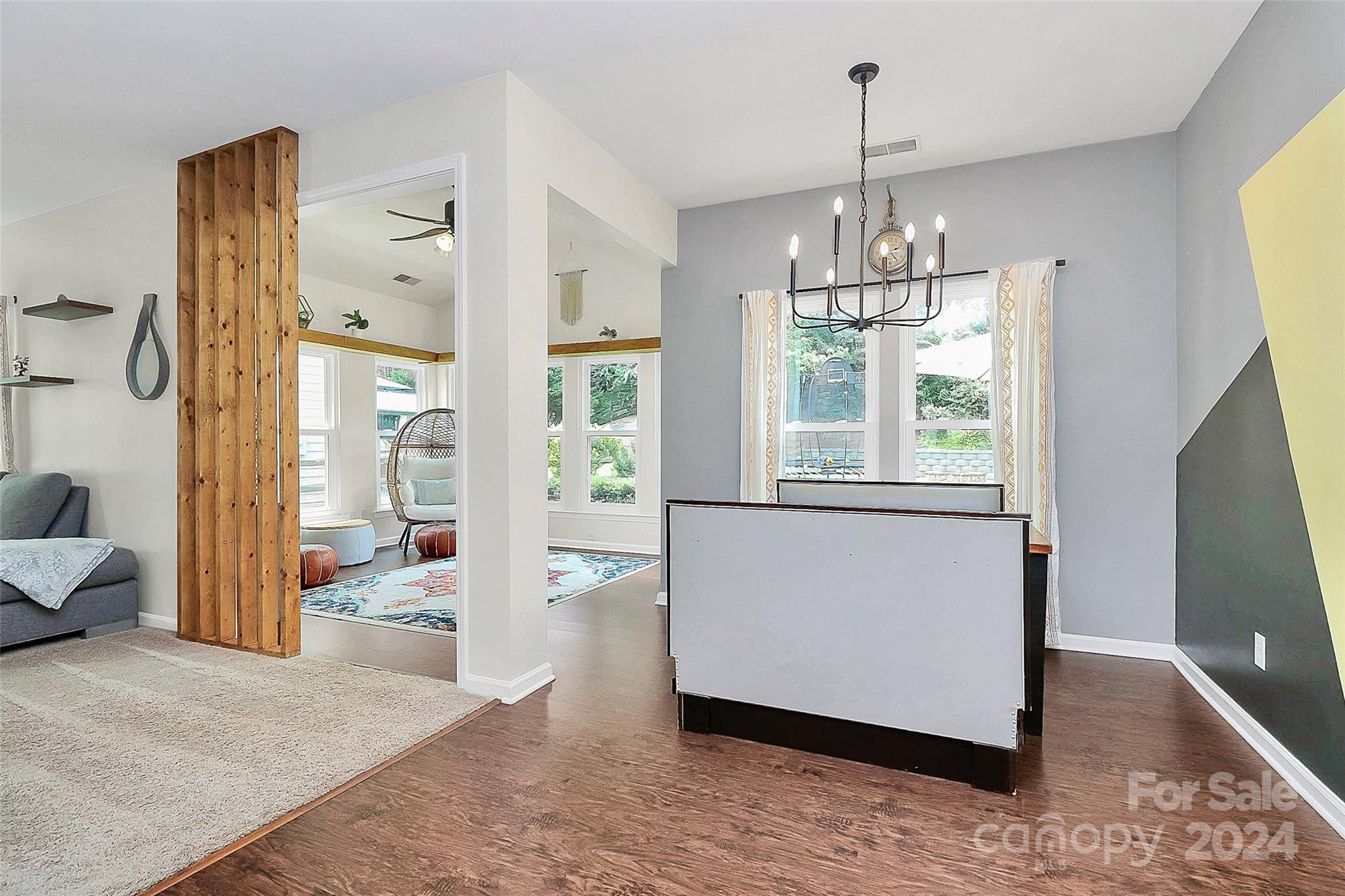 536 St George Road Fort Mill, SC 29708 - Photo 25 of 48 a view of a hallway with windows and chandelier
