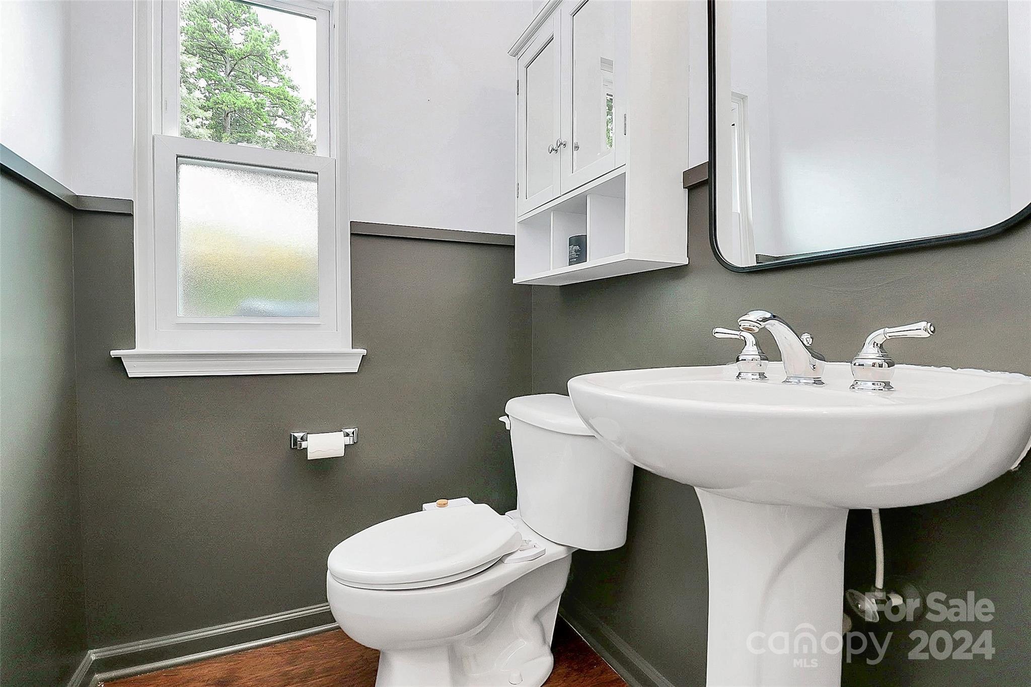 536 St George Road Fort Mill, SC 29708 - Photo 29 of 48 a bathroom with a toilet sink and mirror