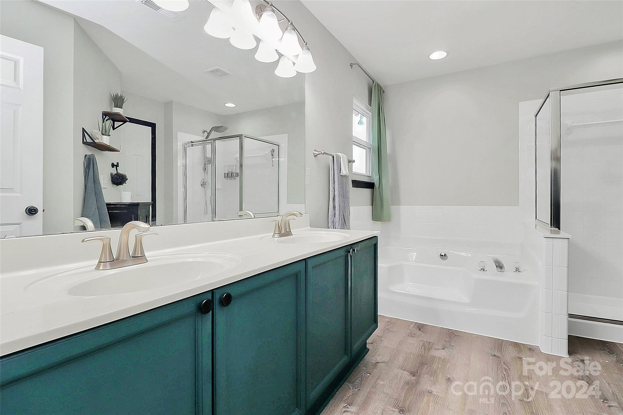 536 St George Road Fort Mill, SC 29708 - Photo 34 of 48 a bathroom with a tub sink and mirror