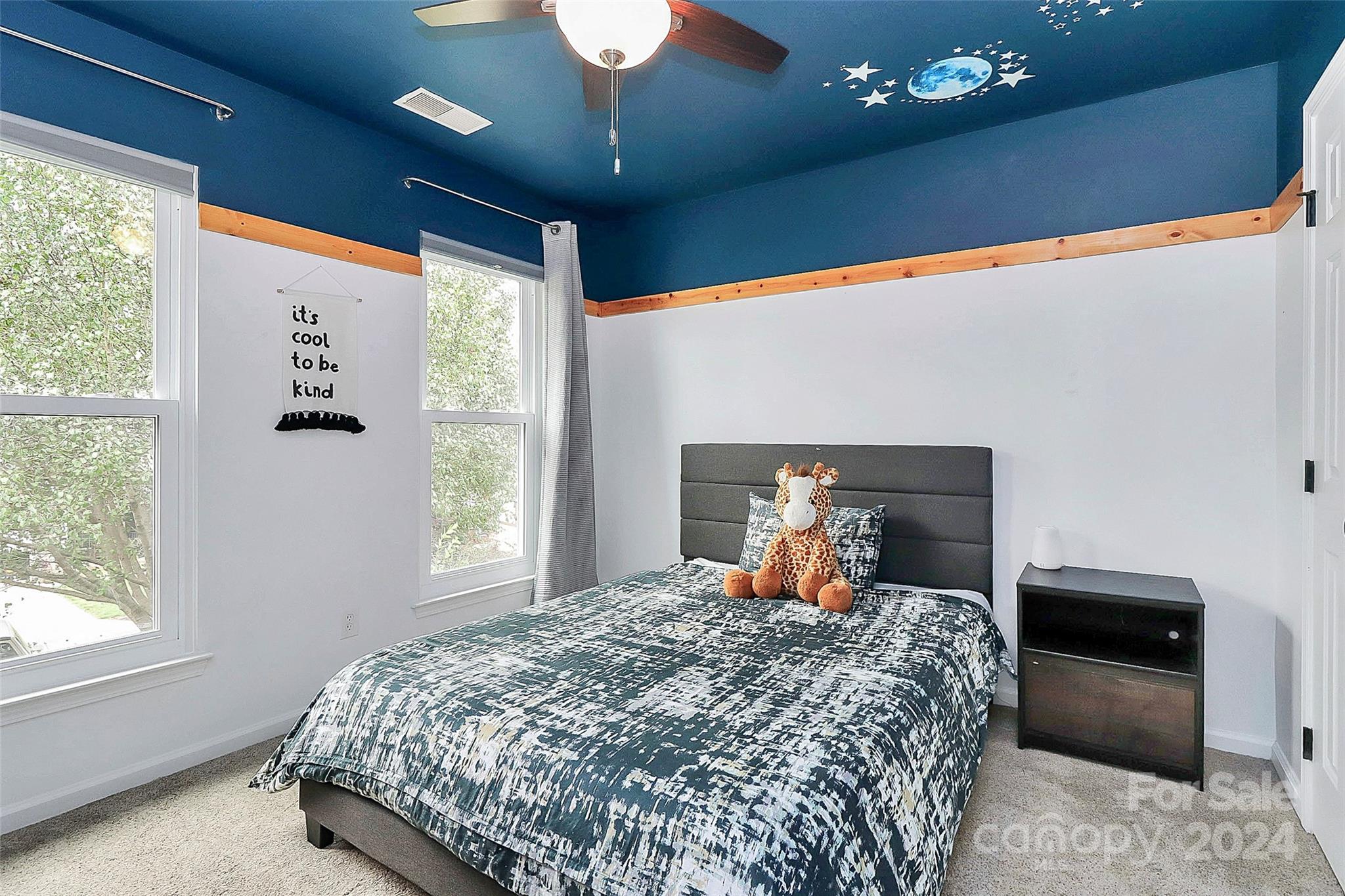 536 St George Road Fort Mill, SC 29708 - Photo 37 of 48 a bedroom with a large bed and a large window