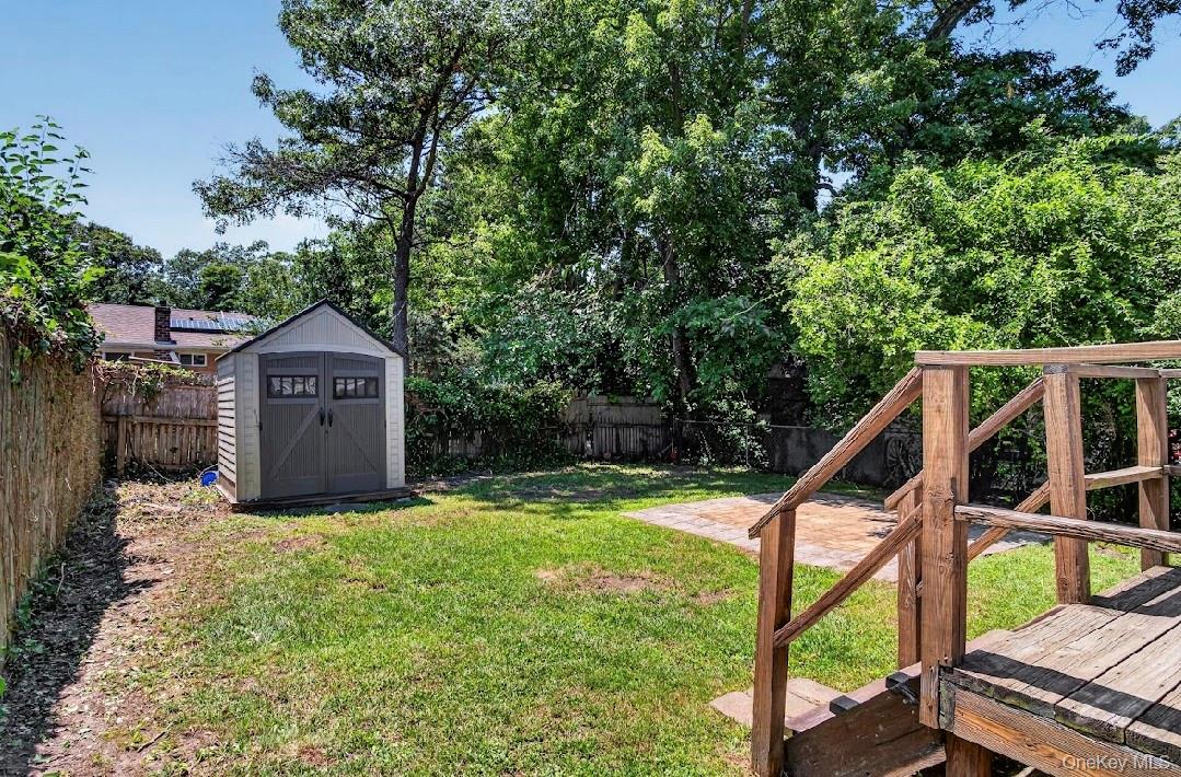 62 Shell Road Rocky Point, NY 11778 - Photo 14 of 22 Backyard with storage shed.