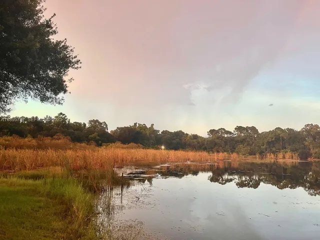 a dining room with a window and a table