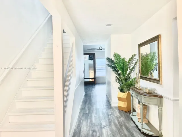 a dining room with a window and a table