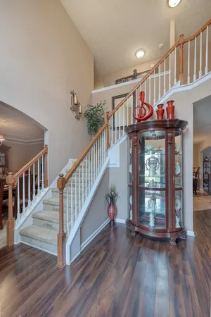 a view of entryway with an entryway and wooden floor