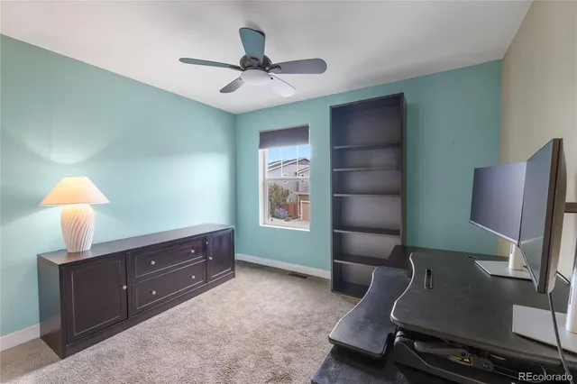 a room with furniture and a flat screen tv