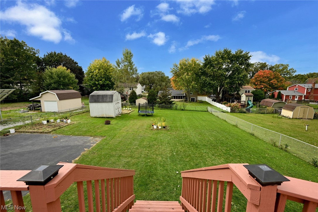 4574 Fishcreek Road Stow, OH 44224 - Photo 9 of 49 View of yard with a storage shed