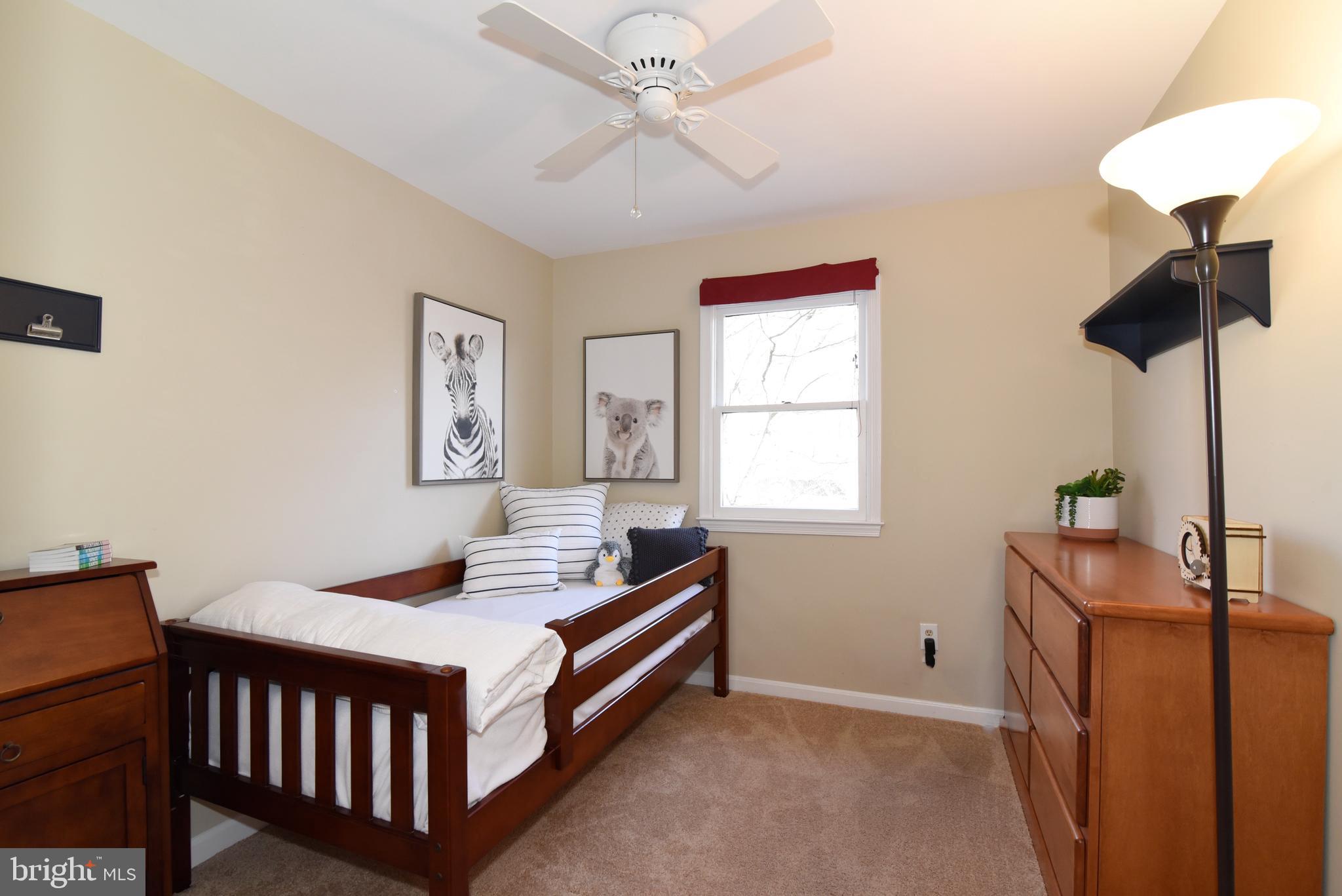 2208 Spinnaker Court Reston, VA 20191 - Photo 34 of 39 a bedroom with furniture and a window