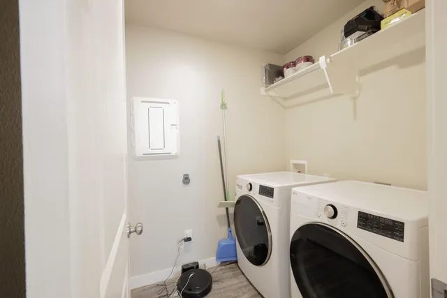 a utility room with dryer and washer