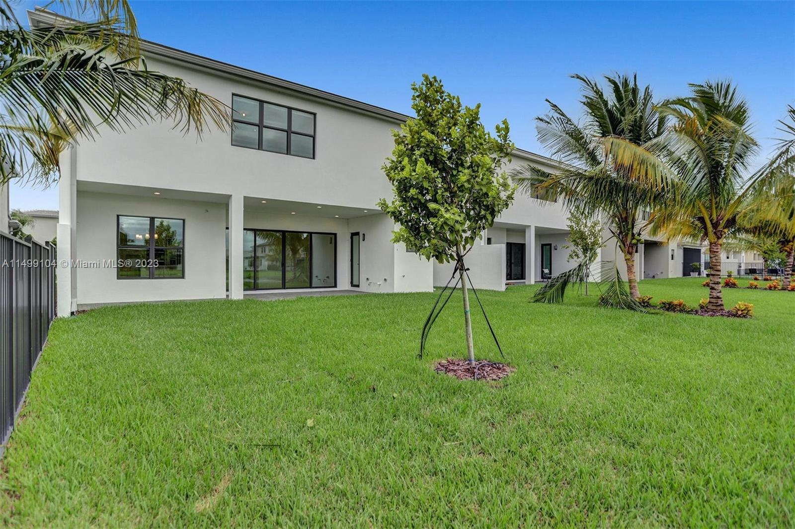 17185 Teton River Road Boca Raton, FL 33496 - Photo 32 of 89 a house view with a garden space