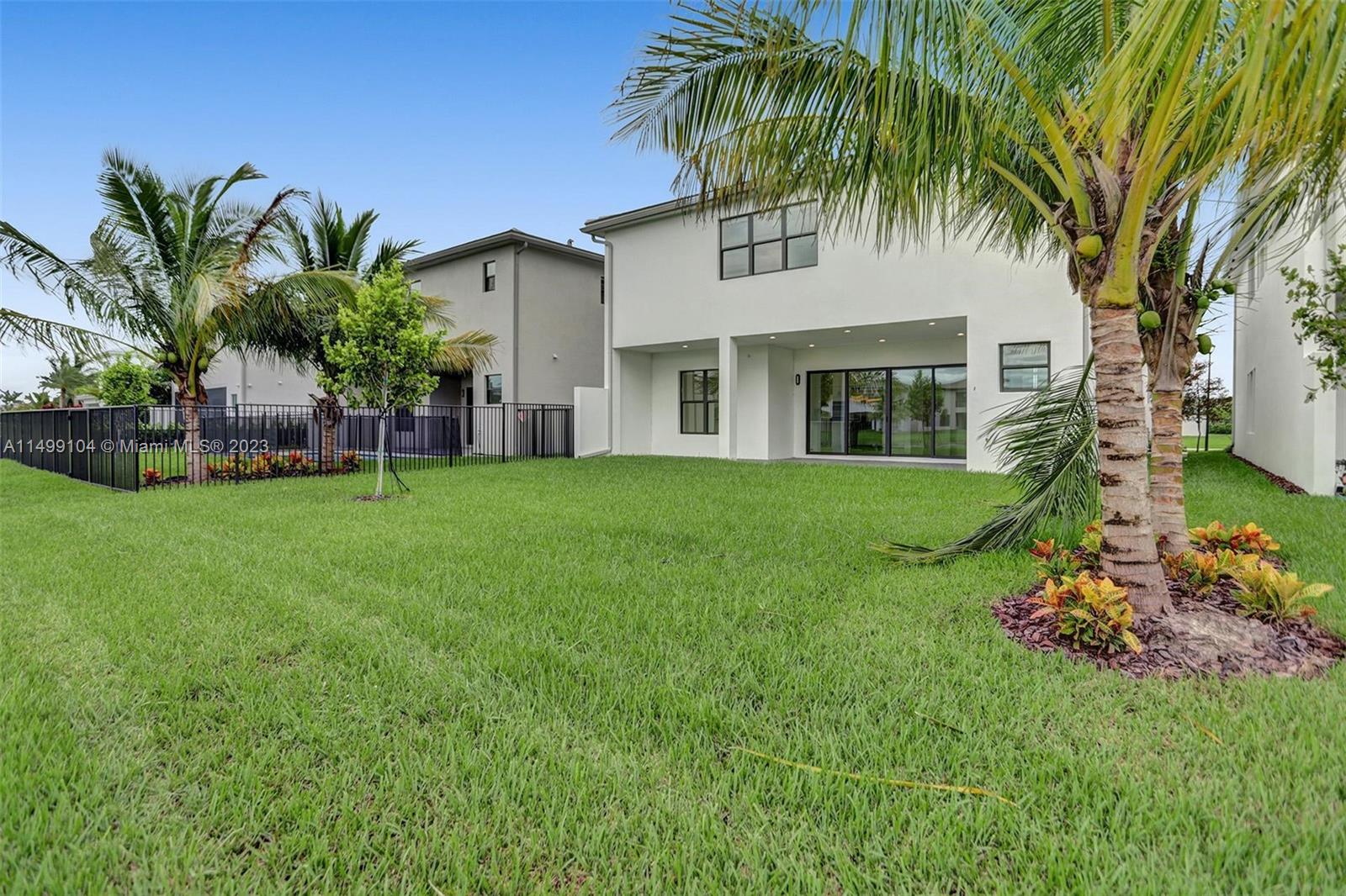 17185 Teton River Road Boca Raton, FL 33496 - Photo 35 of 89 a front view of house with yard and green space
