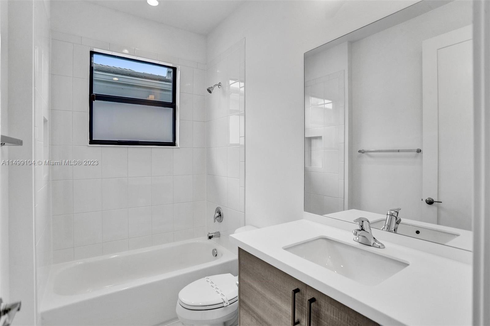 17185 Teton River Road Boca Raton, FL 33496 - Photo 43 of 89 a bathroom with a sink vanity tub and toilet