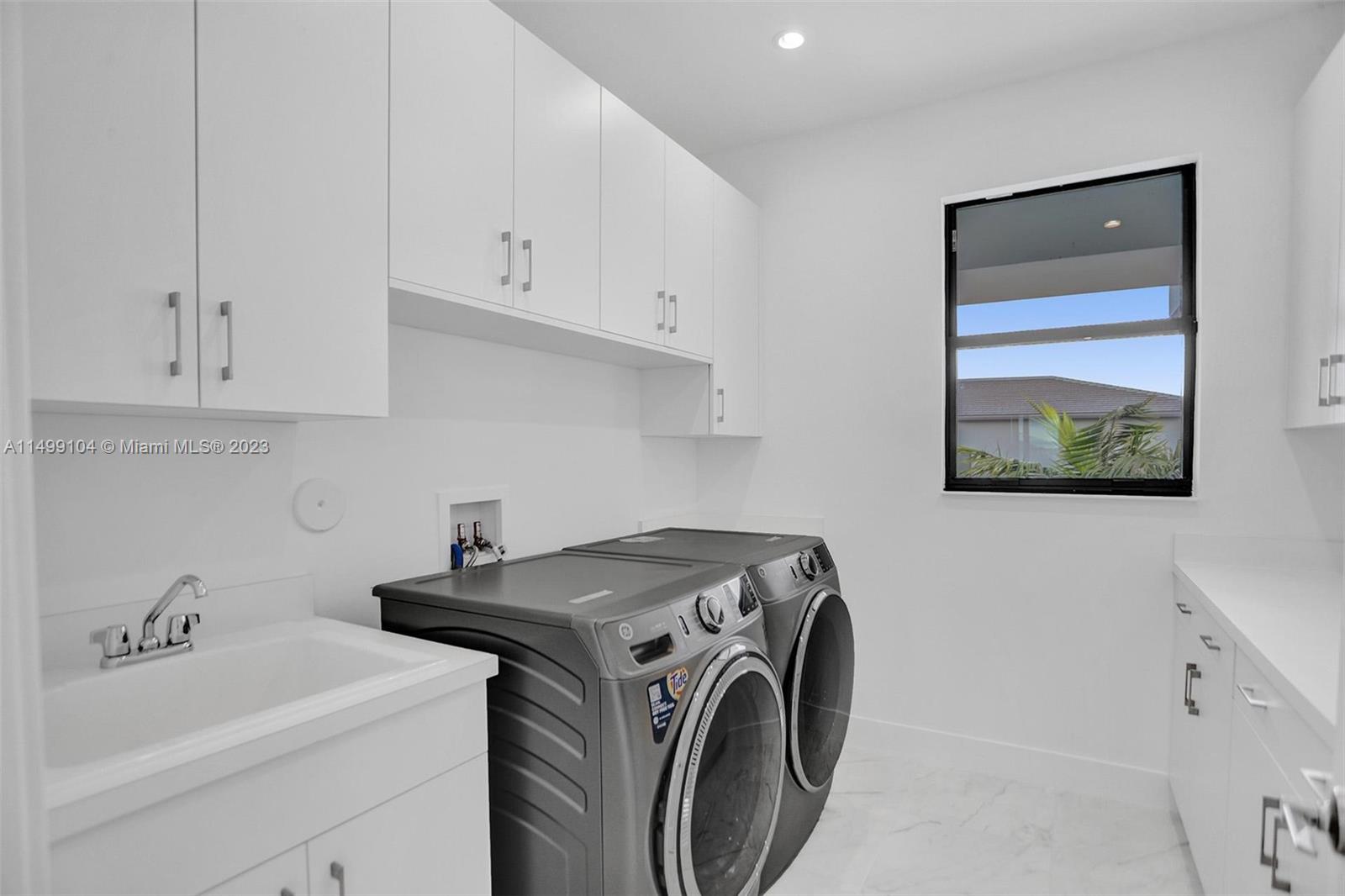 17185 Teton River Road Boca Raton, FL 33496 - Photo 46 of 89 a utility room with dryer and washer
