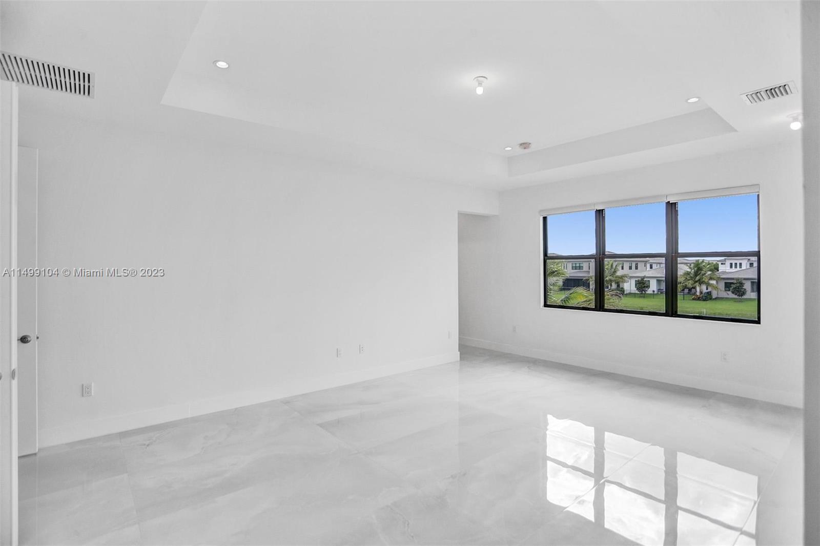 17185 Teton River Road Boca Raton, FL 33496 - Photo 57 of 89 a view of an empty room with a window