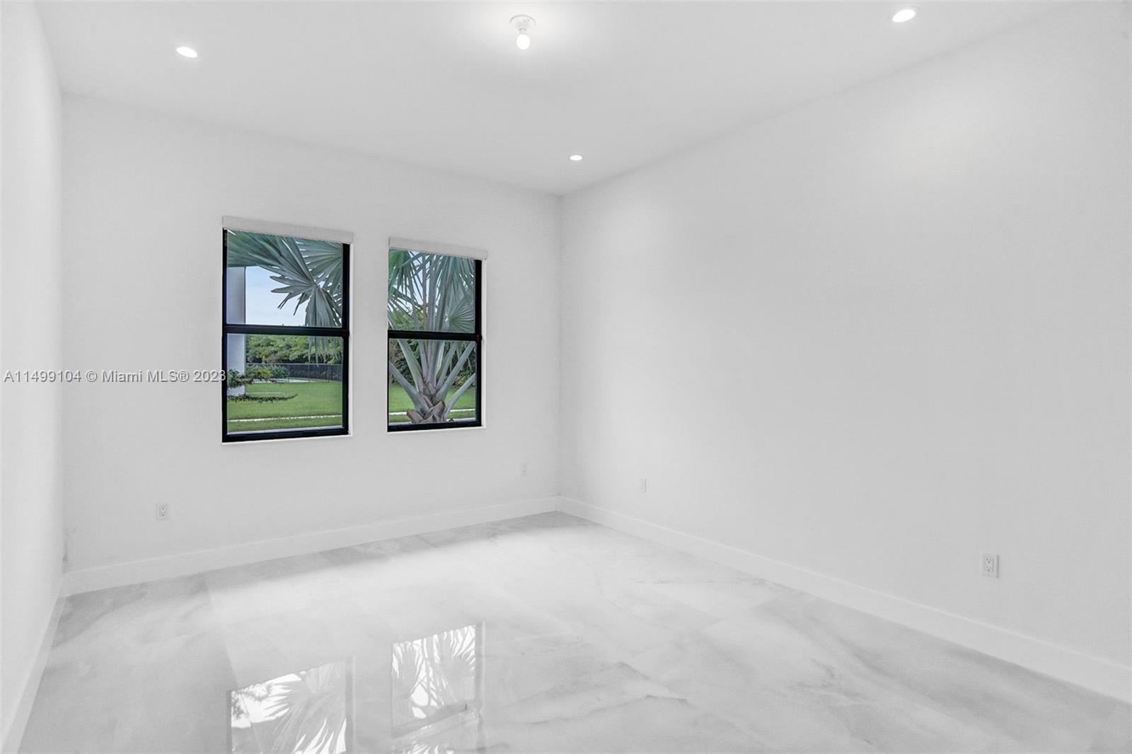 17185 Teton River Road Boca Raton, FL 33496 - Photo 6 of 89 an empty room with windows